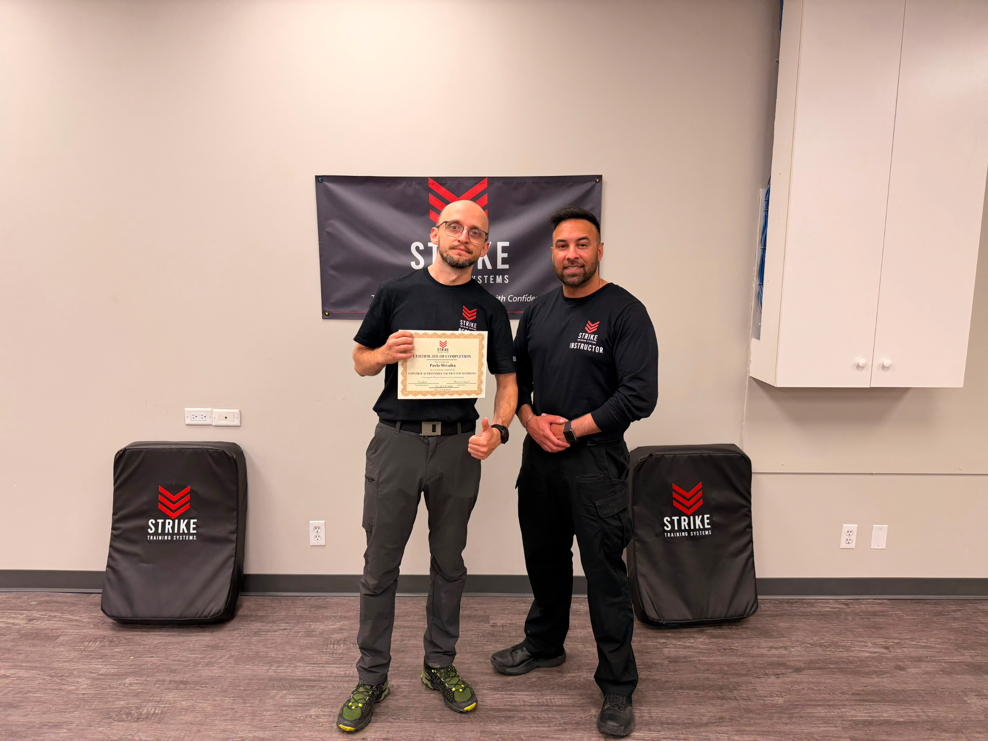 strike-training-systems-calgary-control-defensive-tactics-certificate-graduation-01-Calgary