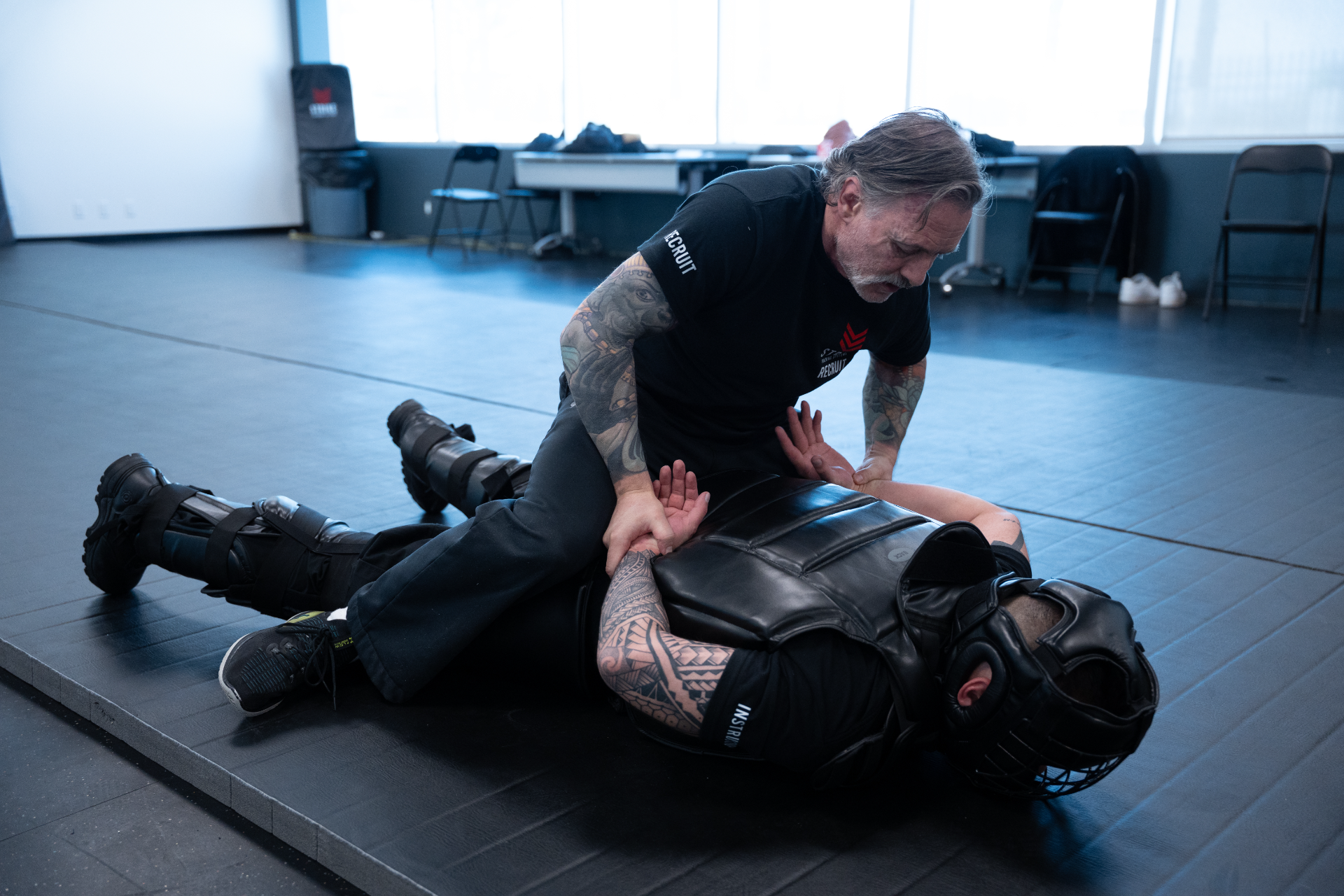 strike-training-systems-calgary-ground-control-arm-control-redman-suit-02-Calgary