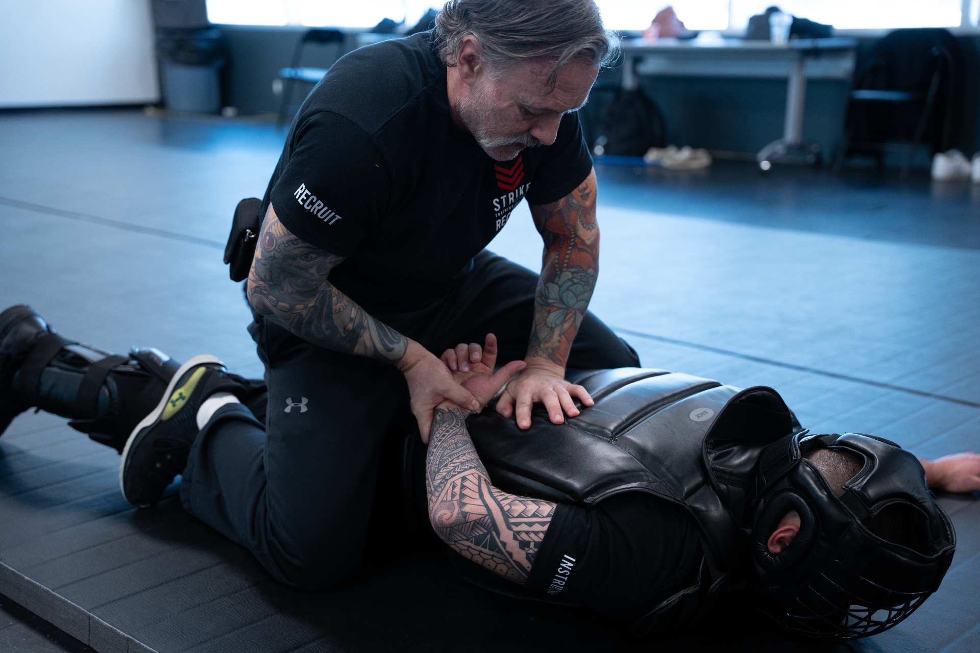 strike-training-systems-calgary-ground-control-wristlock-redman-suit-01-Calgary