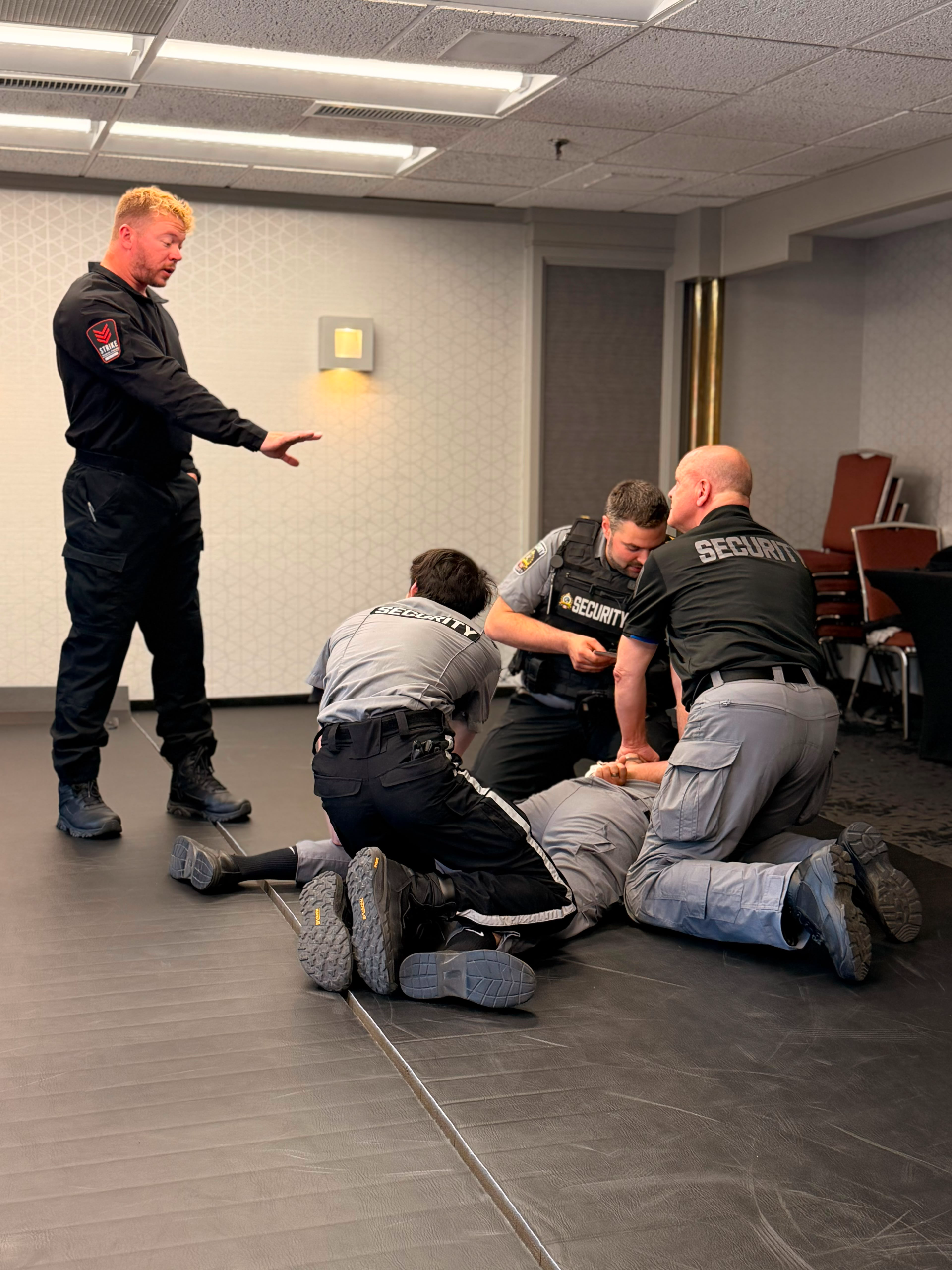 strike-training-systems-calgary-instructor-coaching-ground-control-security-01-Calgary