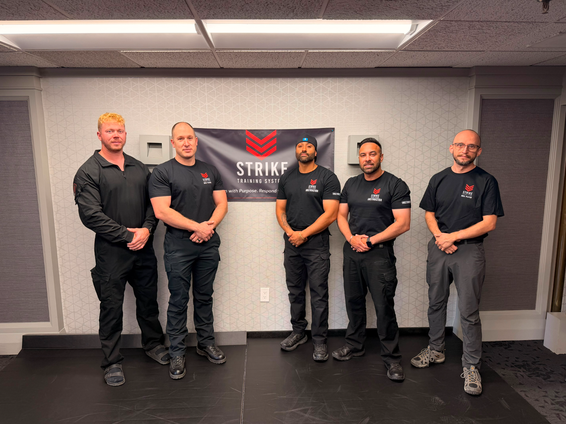 strike-training-systems-calgary-instructor-team-photo-banner-01-Calgary